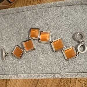 Elegant Silver and Orange Bracelet